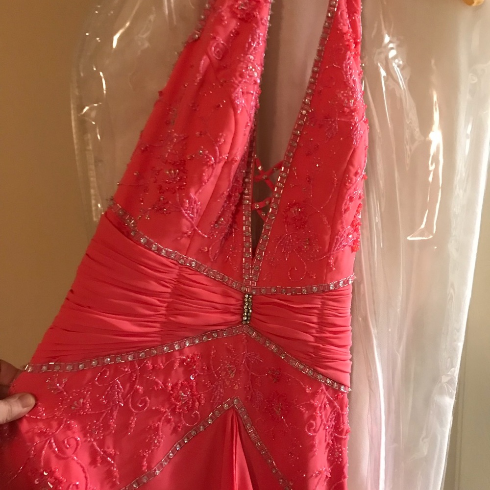 Beautiful halter salmon color long formal beading.